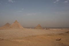 Pyramid of Cheops, Khafre, Menkaure. (for the King, his wife, and son)