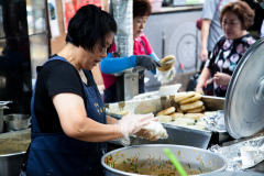 Namdaemun market   Japchae Hoddeok maker.  Always a line at this one.