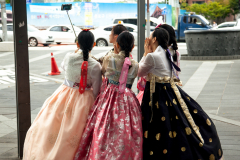 Korean girls in their rented Hanbok getting ready to go to Gyeongbokgung palace.