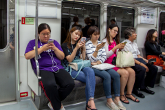 Everyone has a smartphone in always connected...even in the subway.