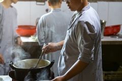 Nun Preparing Lunch - Hue